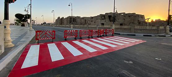 Modern crossings in the ancient city of Luxor