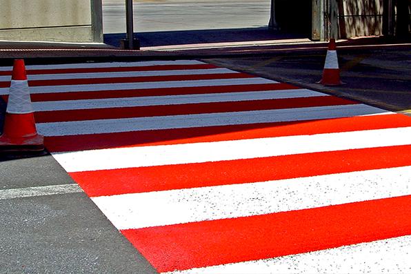 Application of PlastiRoute RP on a parking lot to create a coarse, anti skid texture