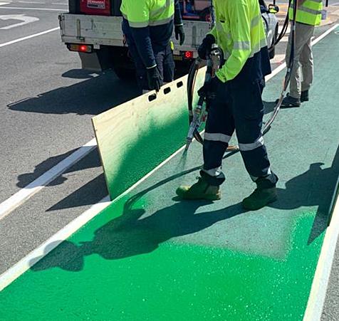 Green bicycle lane painted in green with AreaSpray system in Australia