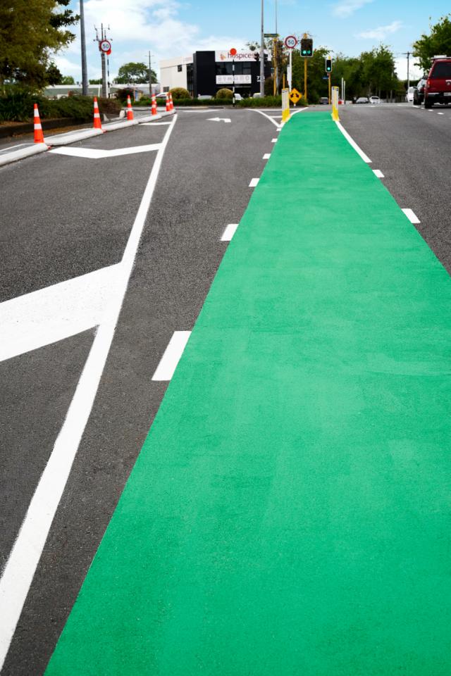 Cold plastic and waterborne material to create area demarcation and bike lane