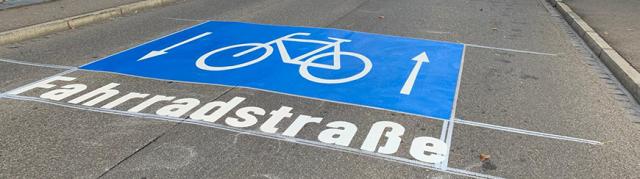 Marking the lanes in bright colours and adding legible symbols arrows or letters to provide road guidance